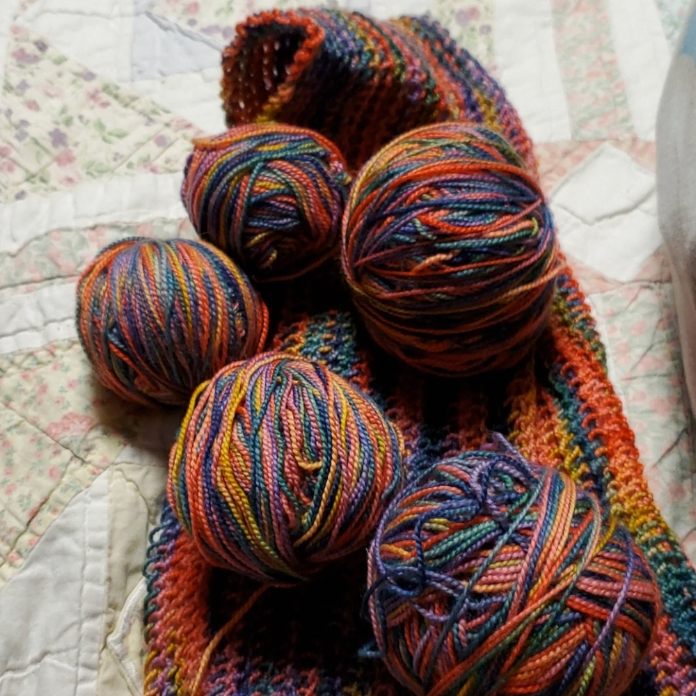 5 NWOT sock yarn balls,and crocheted strip